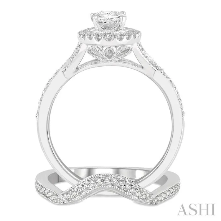 1 1/10 Ctw Free Form Shank Round Cut Diamond Bridal Set With 1 ct Oval Cut Engagement Ring and 1/10 ct Curved Center Wedding Band in 14K White Gold